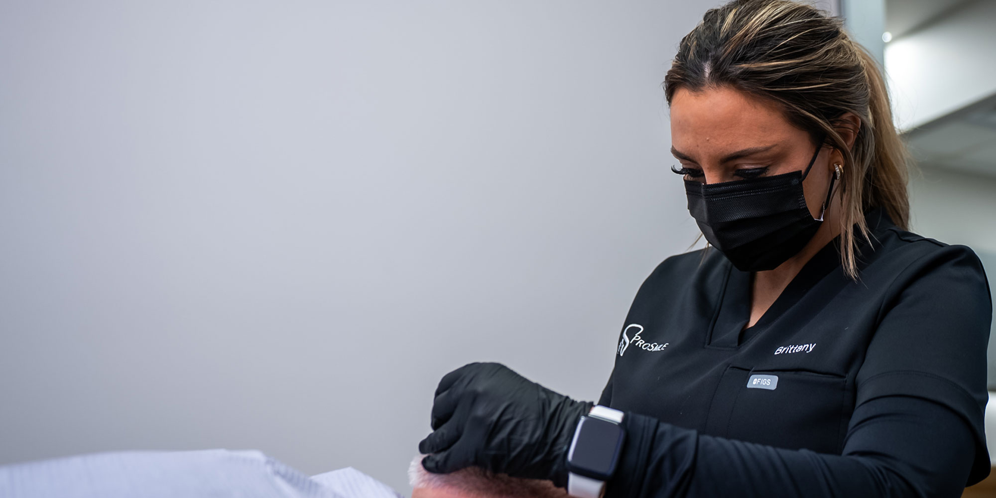 Team member taking a dental scan of Patients mouth